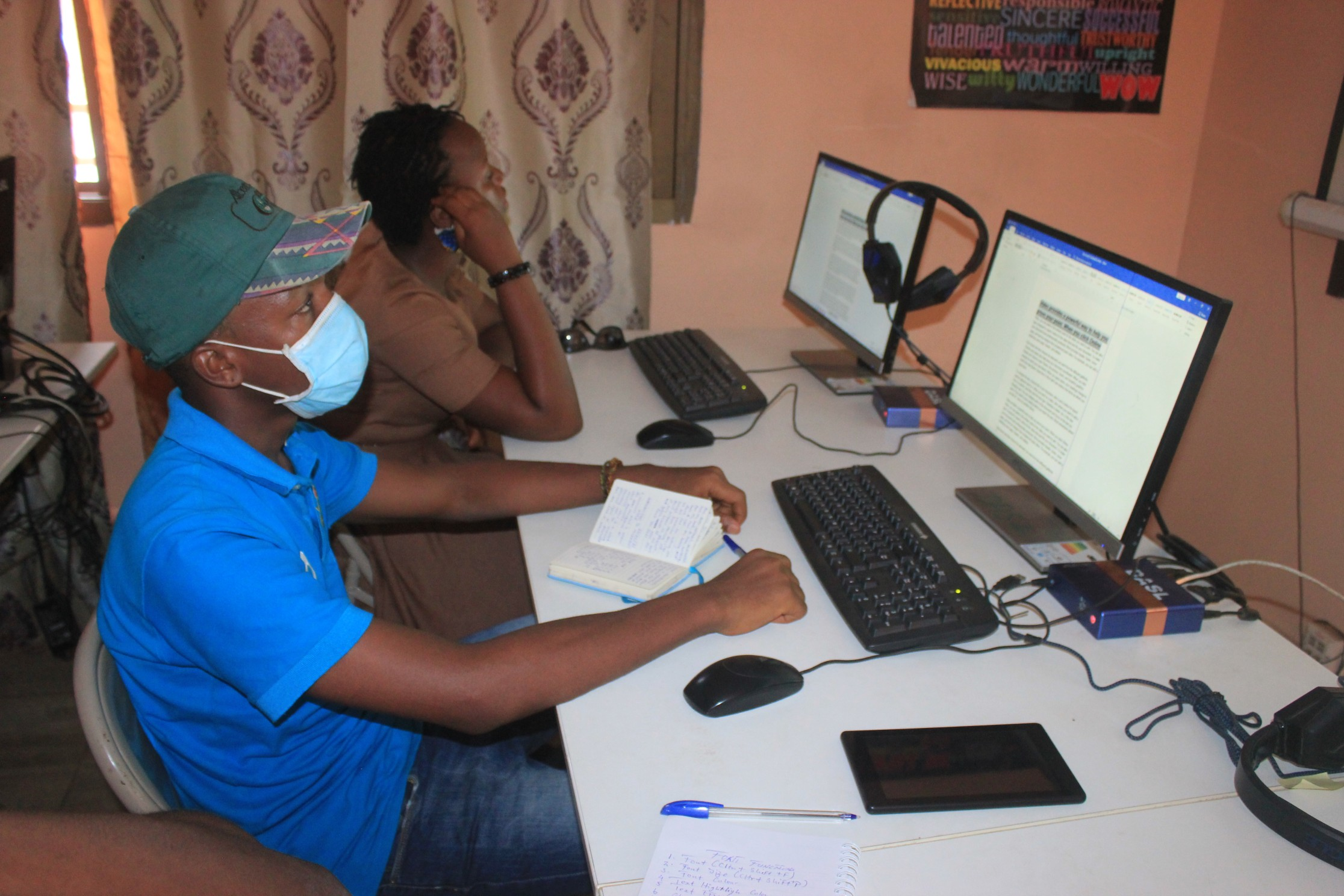 student in develop africa sierra leone computer lab